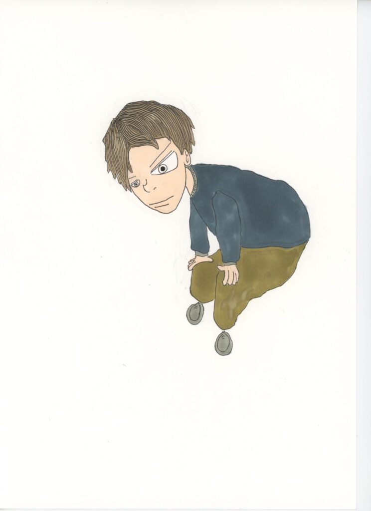 かがんでいる男