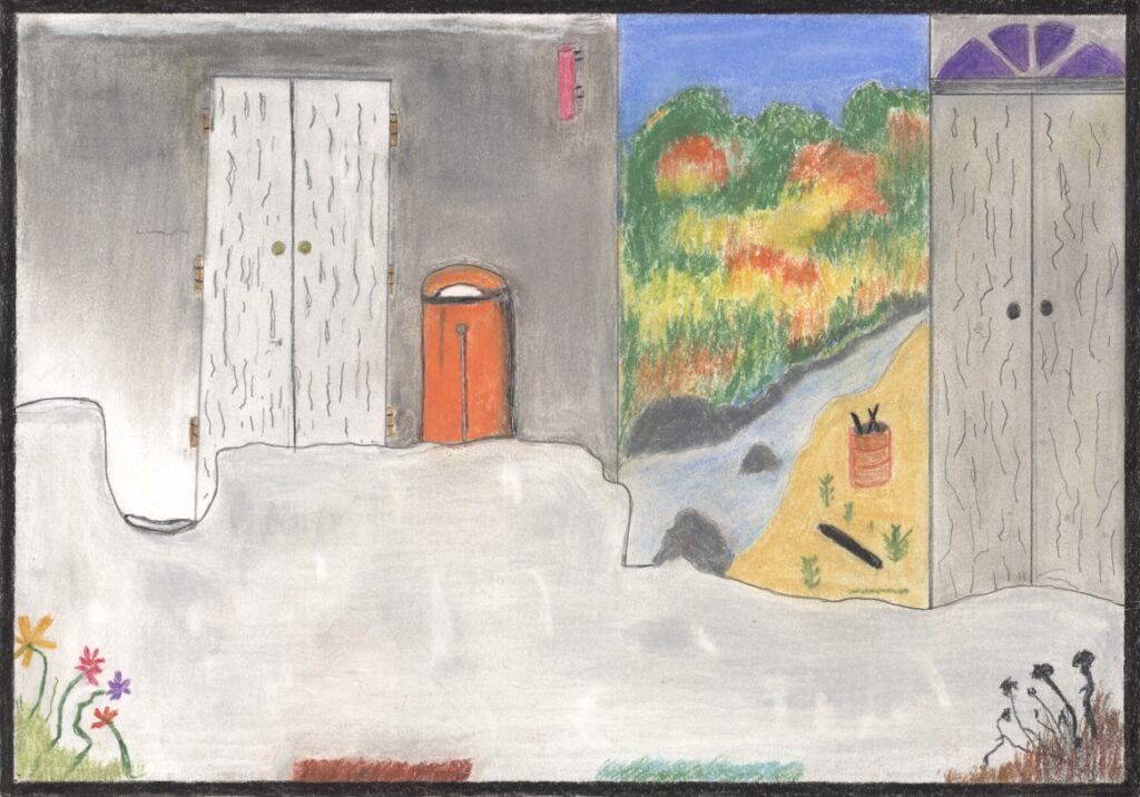 朽ちた扉とその向こうの風景